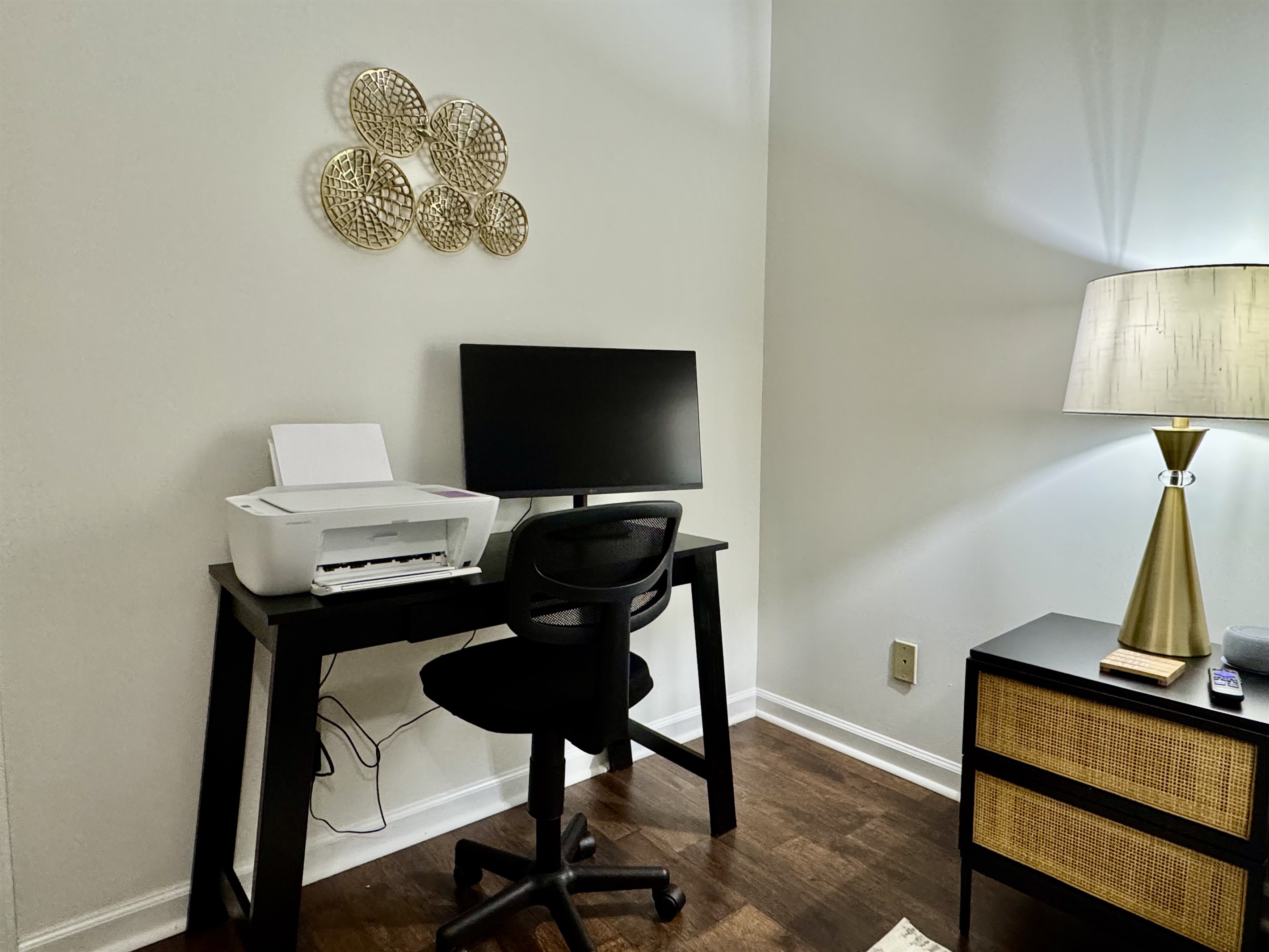 Newly added computer desk, monitor, and printer for guests use