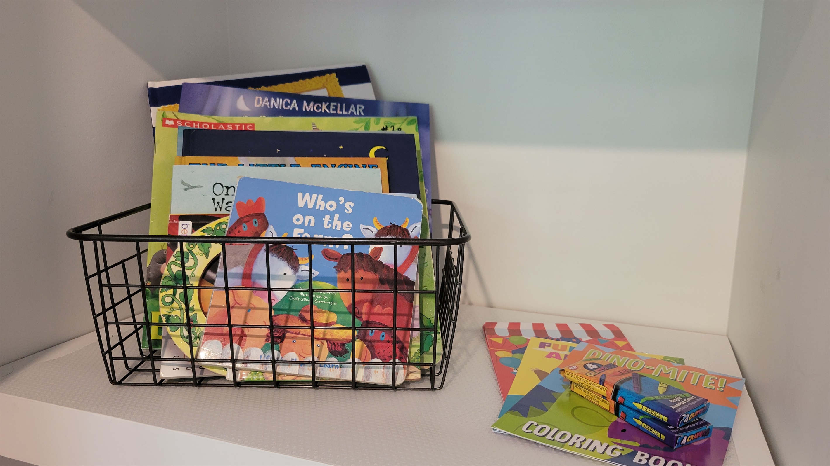 Kids’ books and activity books for keeping little ones entertained during quiet cabin moments.