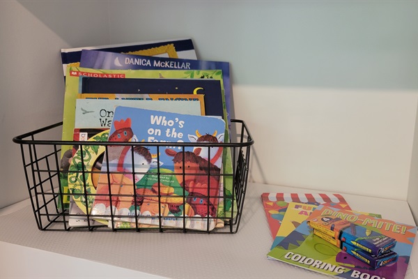 Kids’ books and activity books for keeping little ones entertained during quiet cabin moments.
