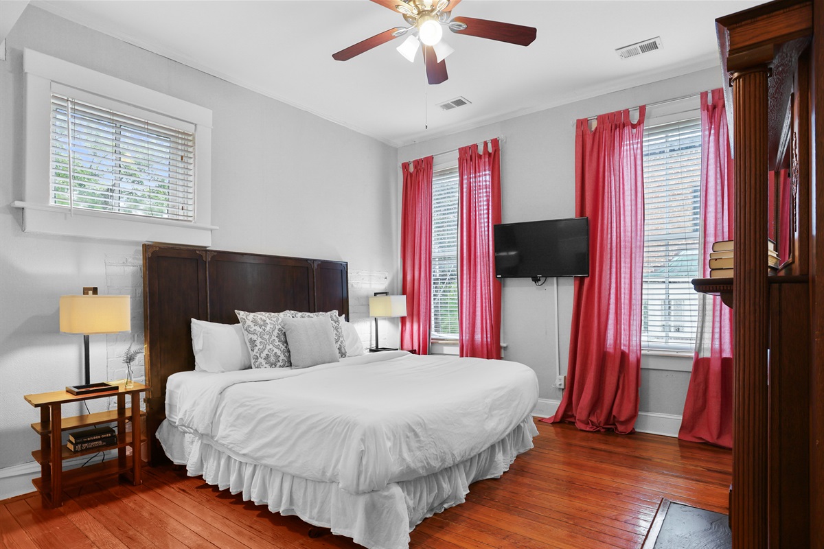 Sleep soundly in the king bedroom, styled for comfort and charm.