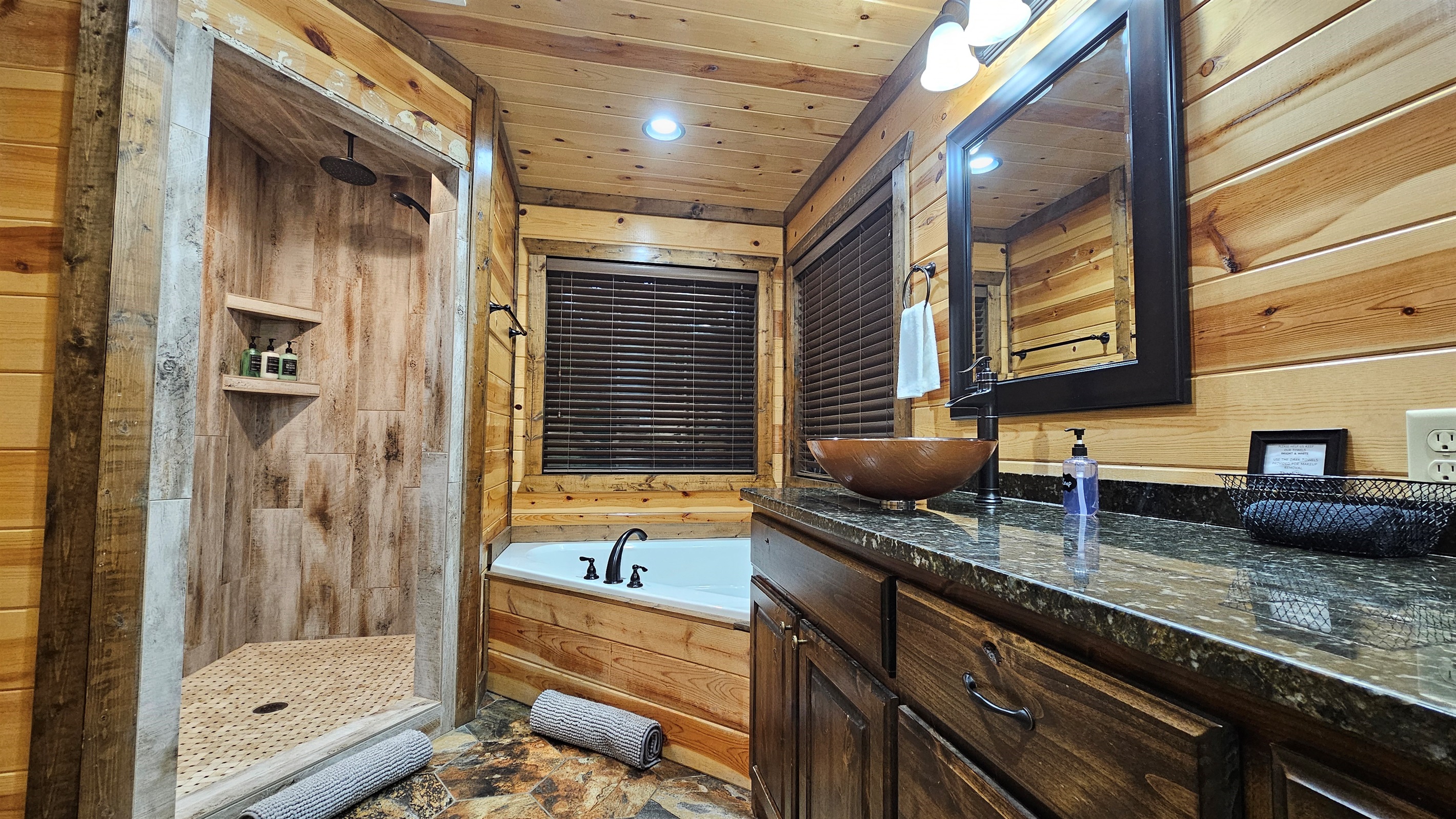 Luxurious Spa Retreat: Indulge in a serene soak or refresh under the rain shower in nature's embrace!