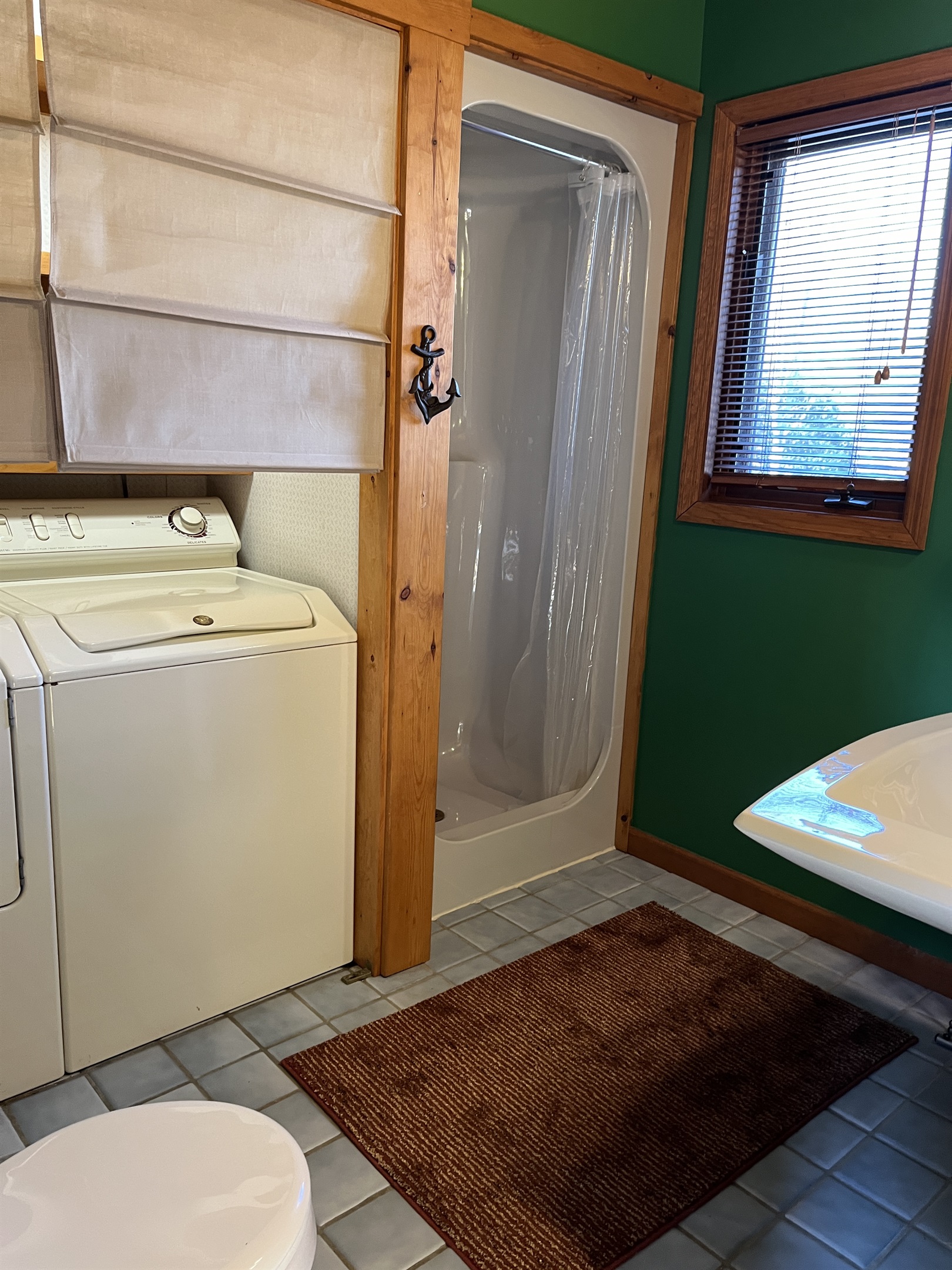 Camp Havon 1st floor full bathroom with shower and washer/dryer.