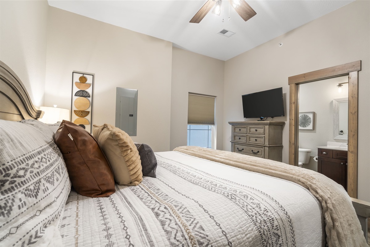 Lower King bed #1 with ensuite bathroom and large TV!