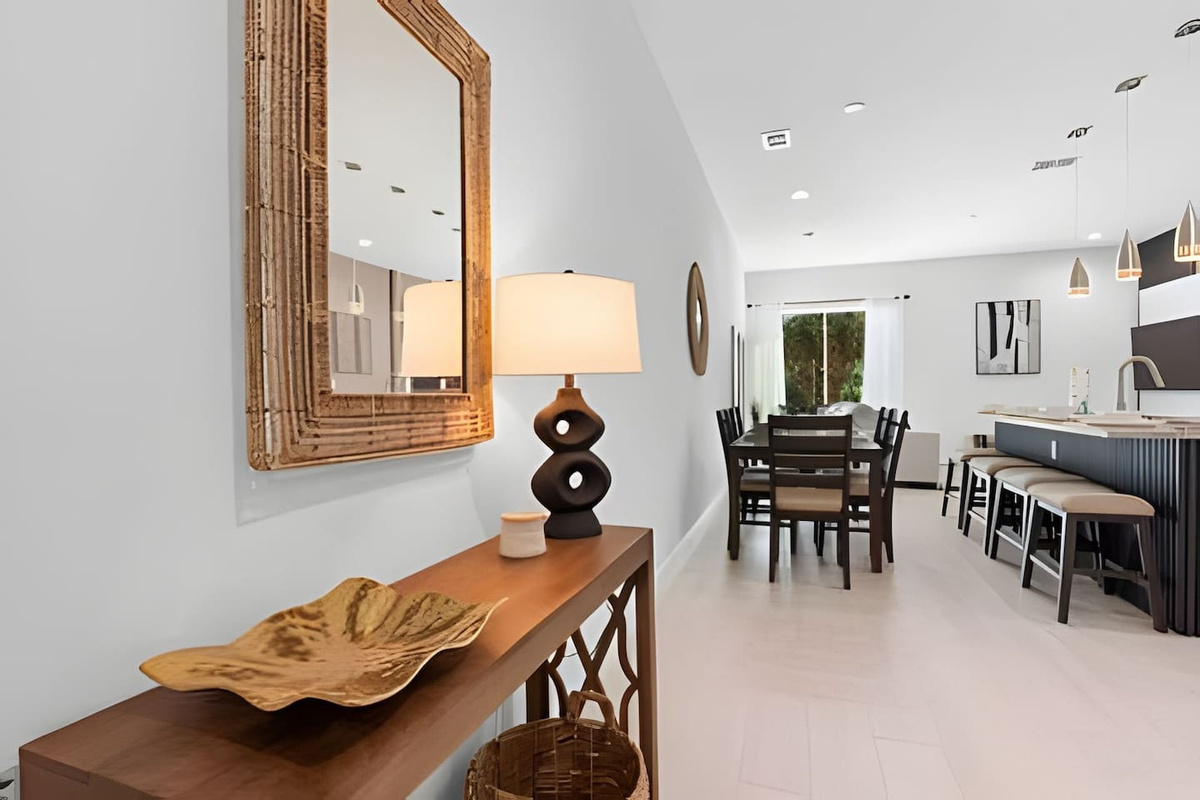 Step into a welcoming entryway with stylish decor.