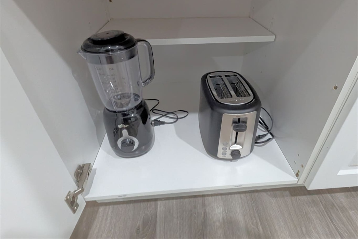 Blender & toaster are provided. 