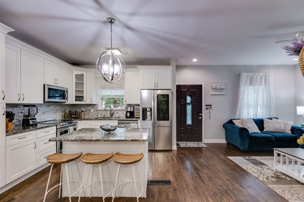 The open living area flows right into the kitchen, so conversations and laughter never have to stop while you’re cooking or enjoying snacks together.