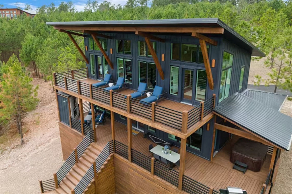 Exterior view of multi-level modern cabin.