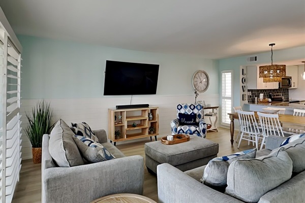 Spacious living area with smart TV