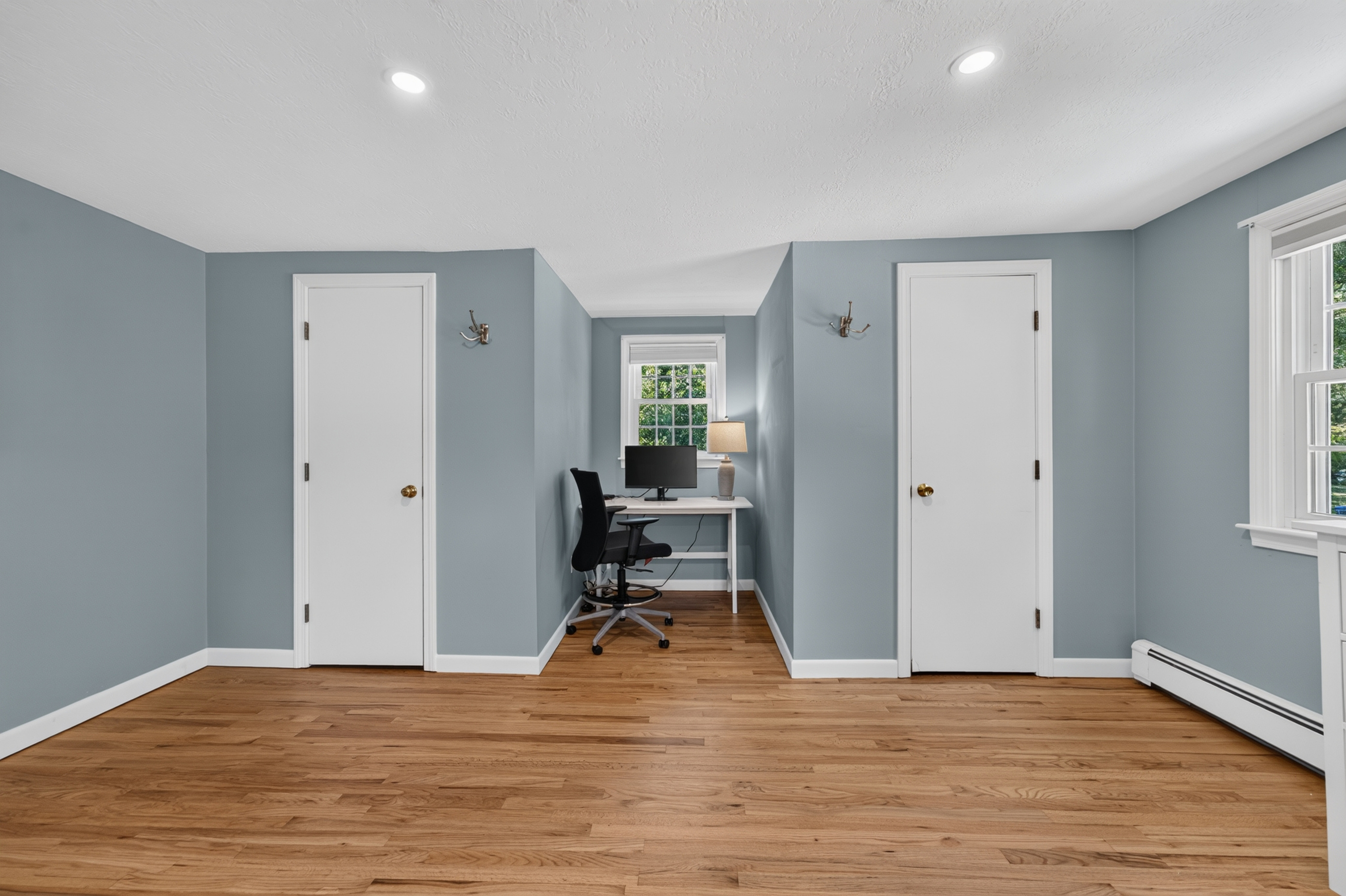 Bright and airy primary suite with a calming, open feel.