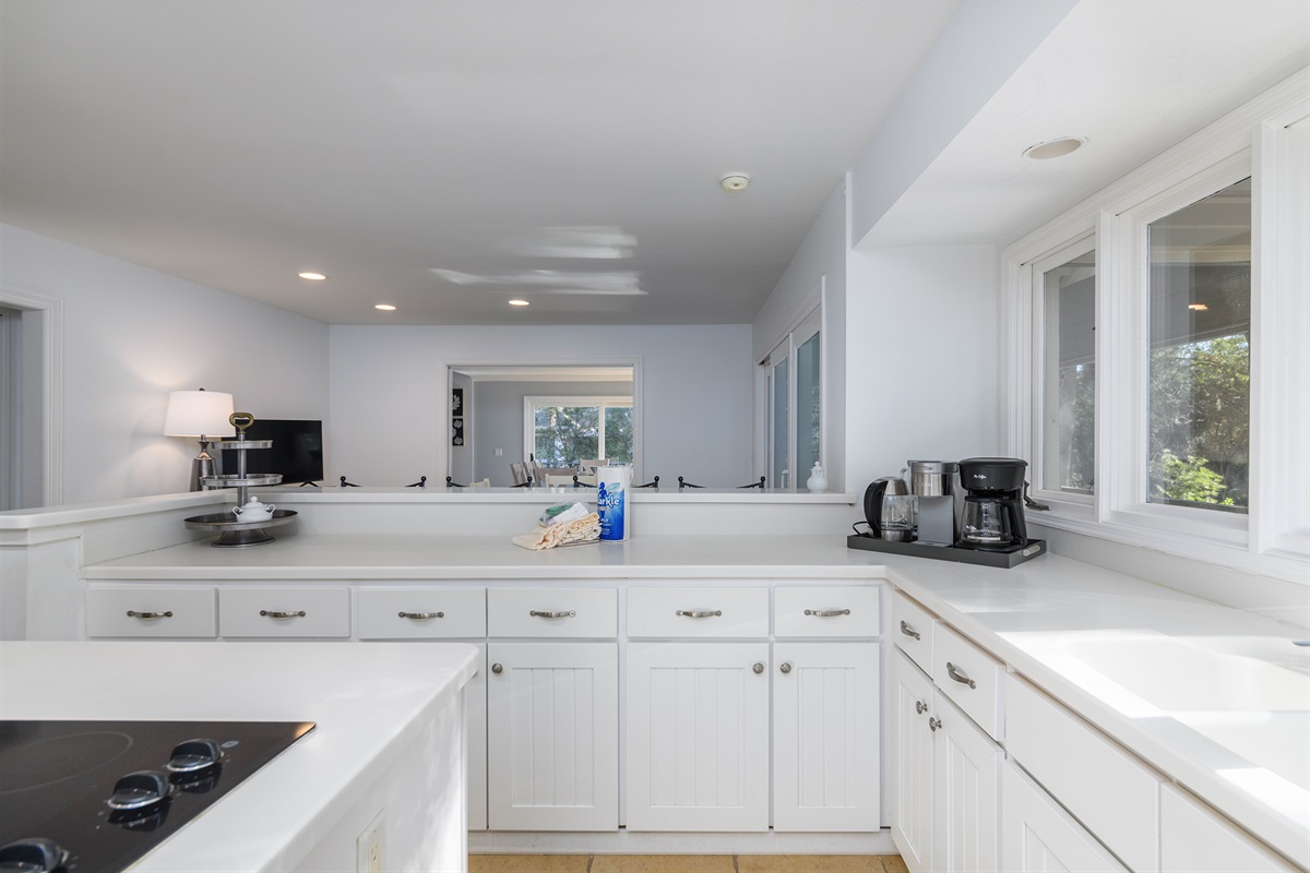 View from kitchen to breakfast area and dining room