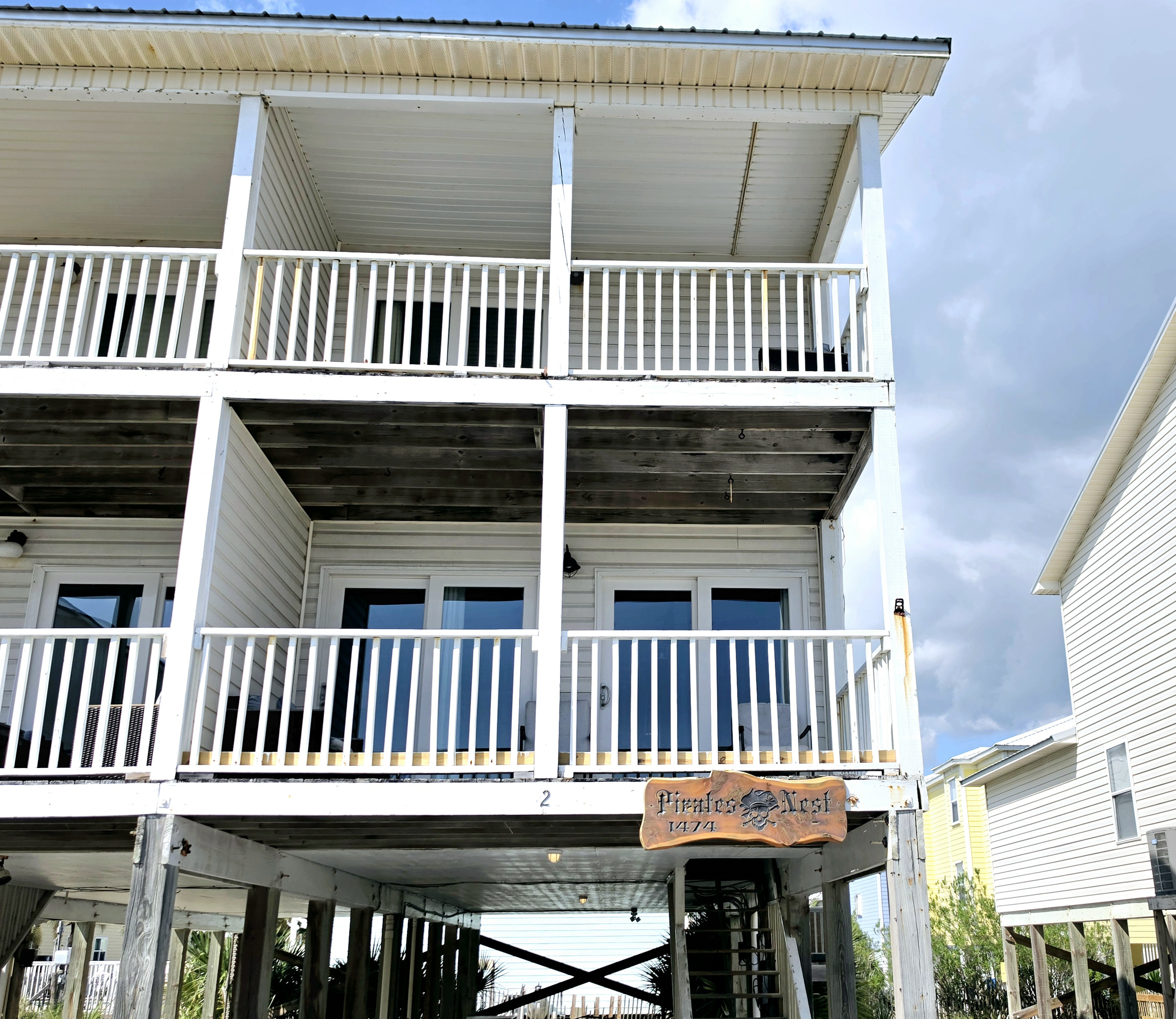 Covered balconies and the Pirates Nest sign