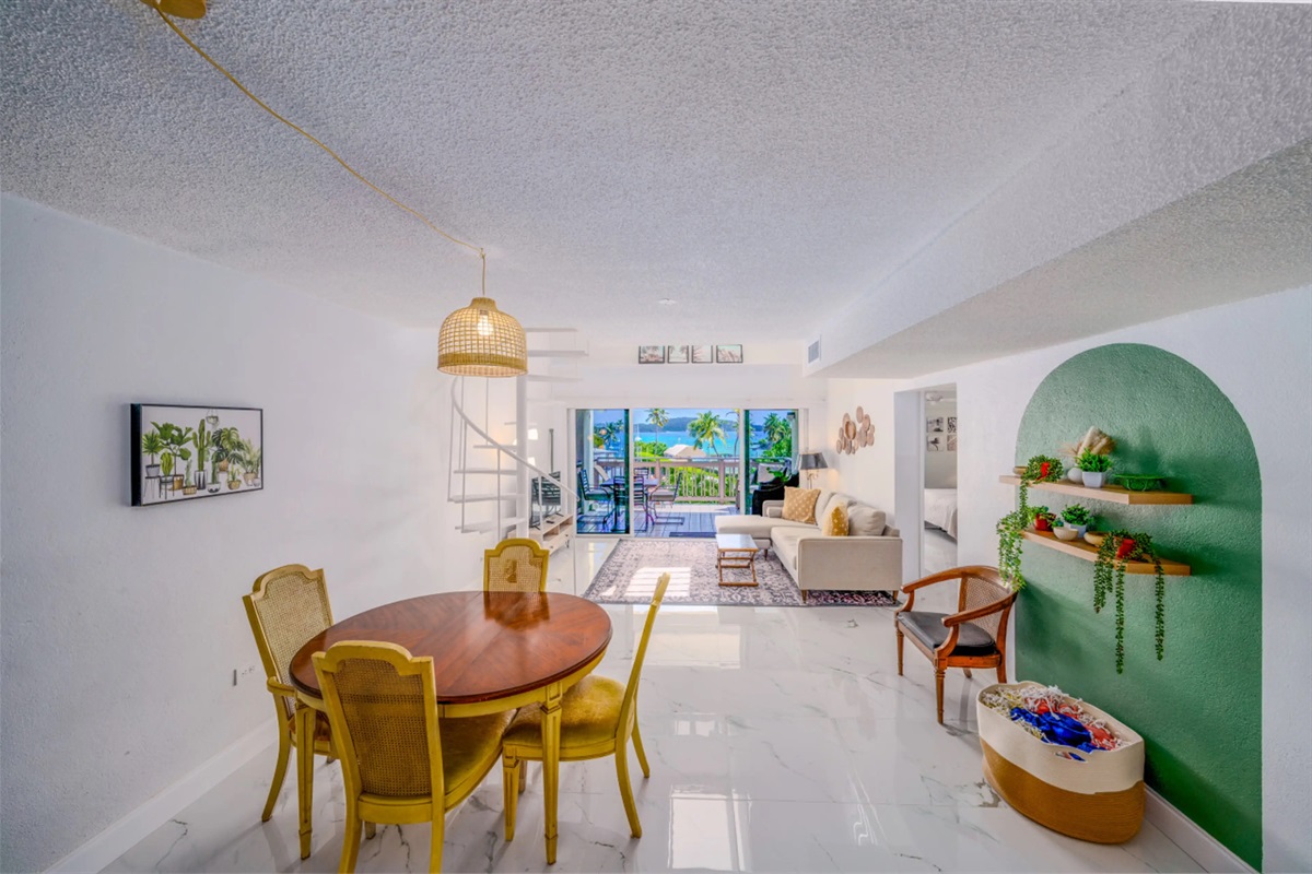 Open-concept dining and living spaces create the perfect setting for relaxing and entertaining.