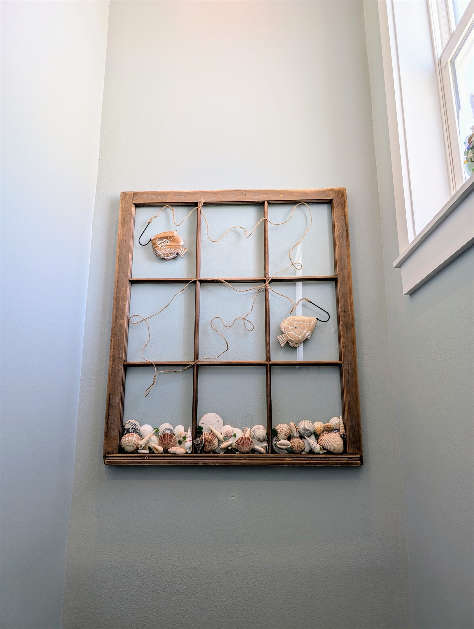 Handmade nautical art work is found throughout the home.