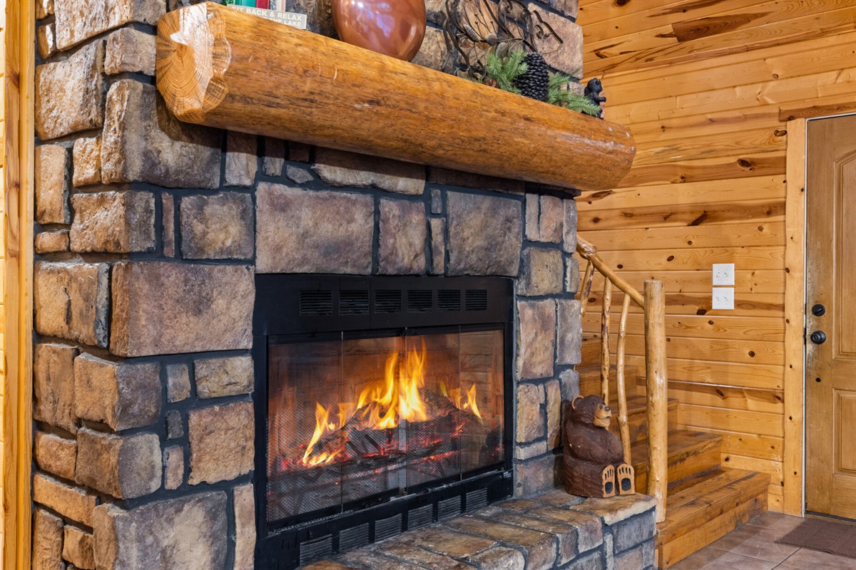 Warm up by the stone fireplace after a day of exploring