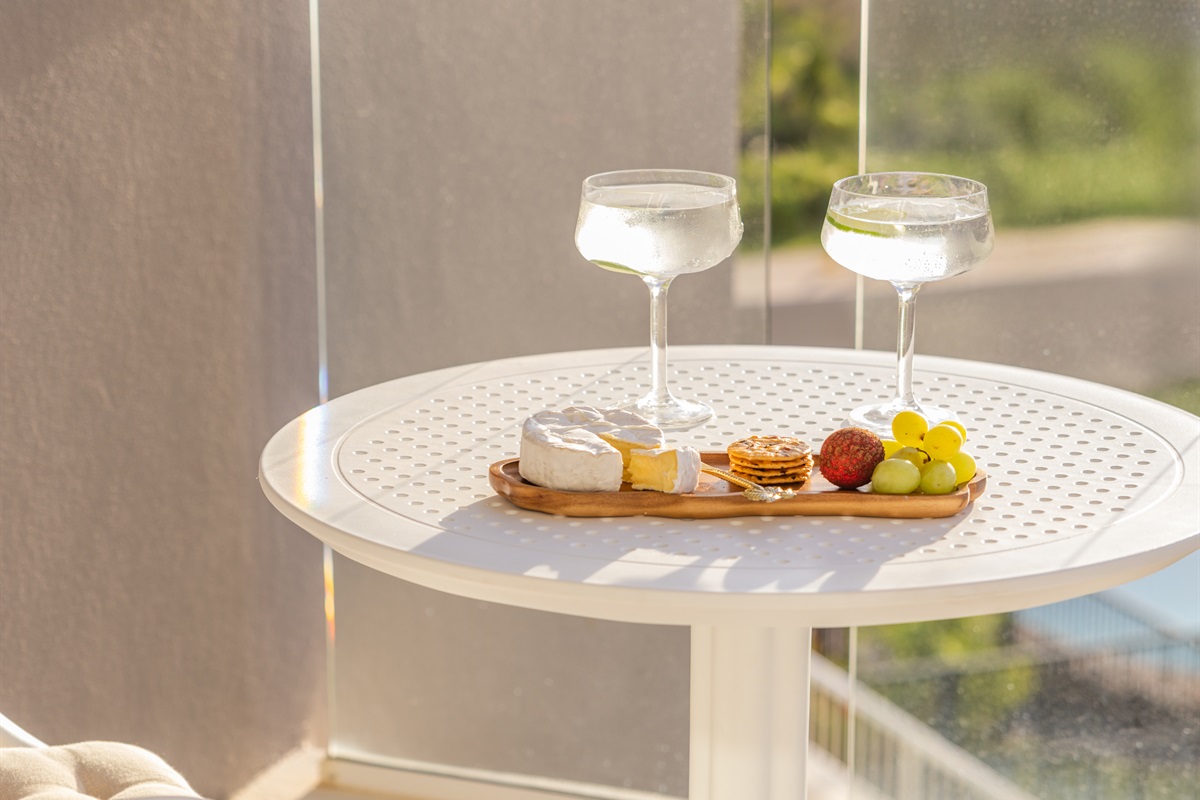 Ocean-view balcony for drinks, snacks & sunshine.