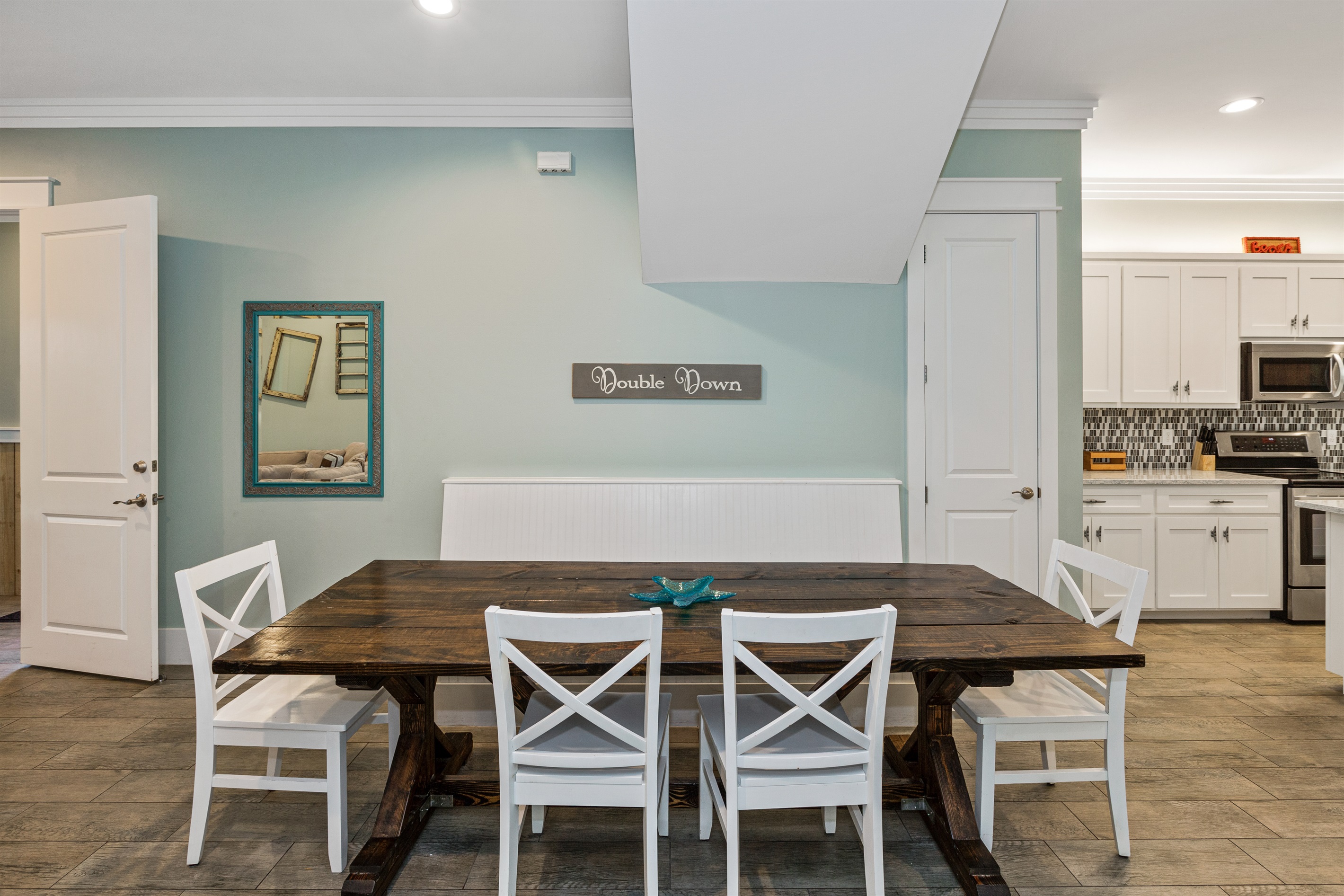 Custom-designed table and seating bench allow for roll up access.