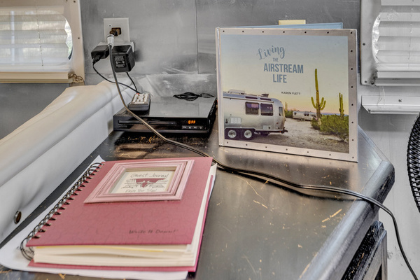 A cozy Airstream nook for coffee, cards, or catching up on a little work