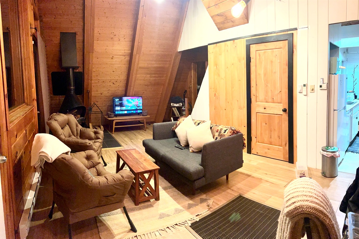 Living Room space with TV and fireplace.