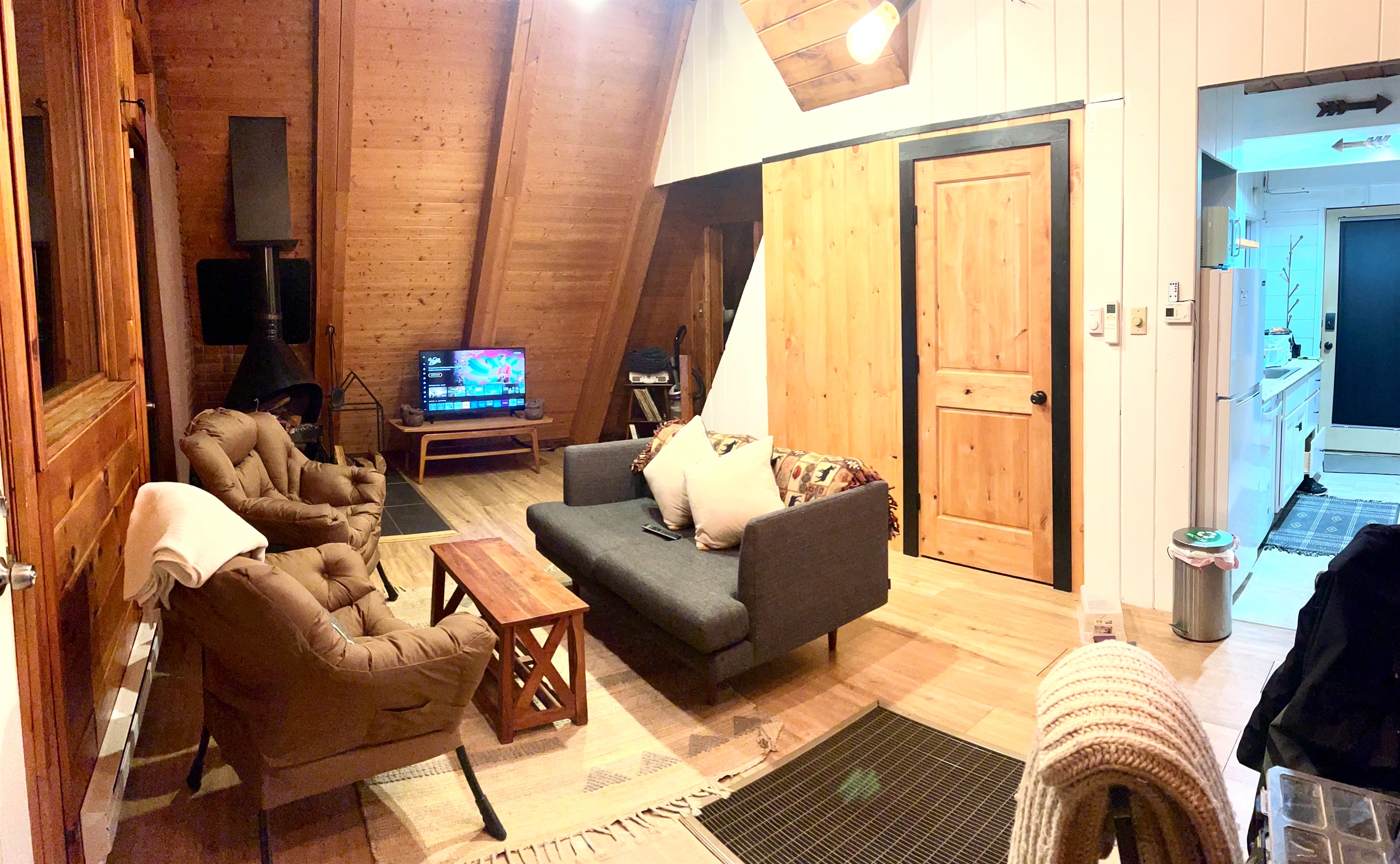 Living Room space with TV and fireplace.