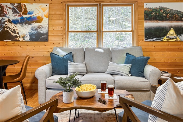 This is a sofa bed, extending the use case of this room even more.