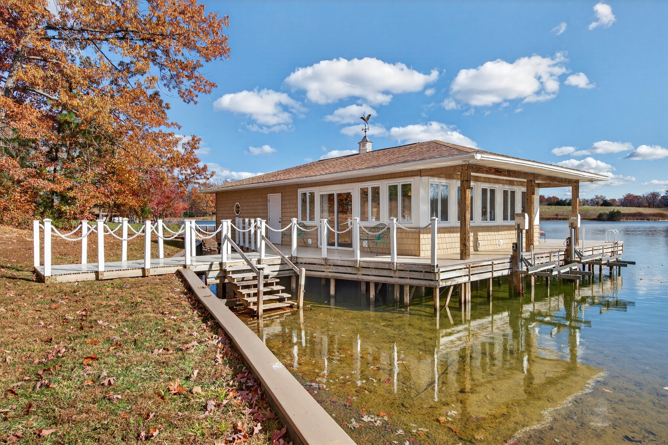The boathouse offers panoramic water views and the perfect place to relax, dine, and play.