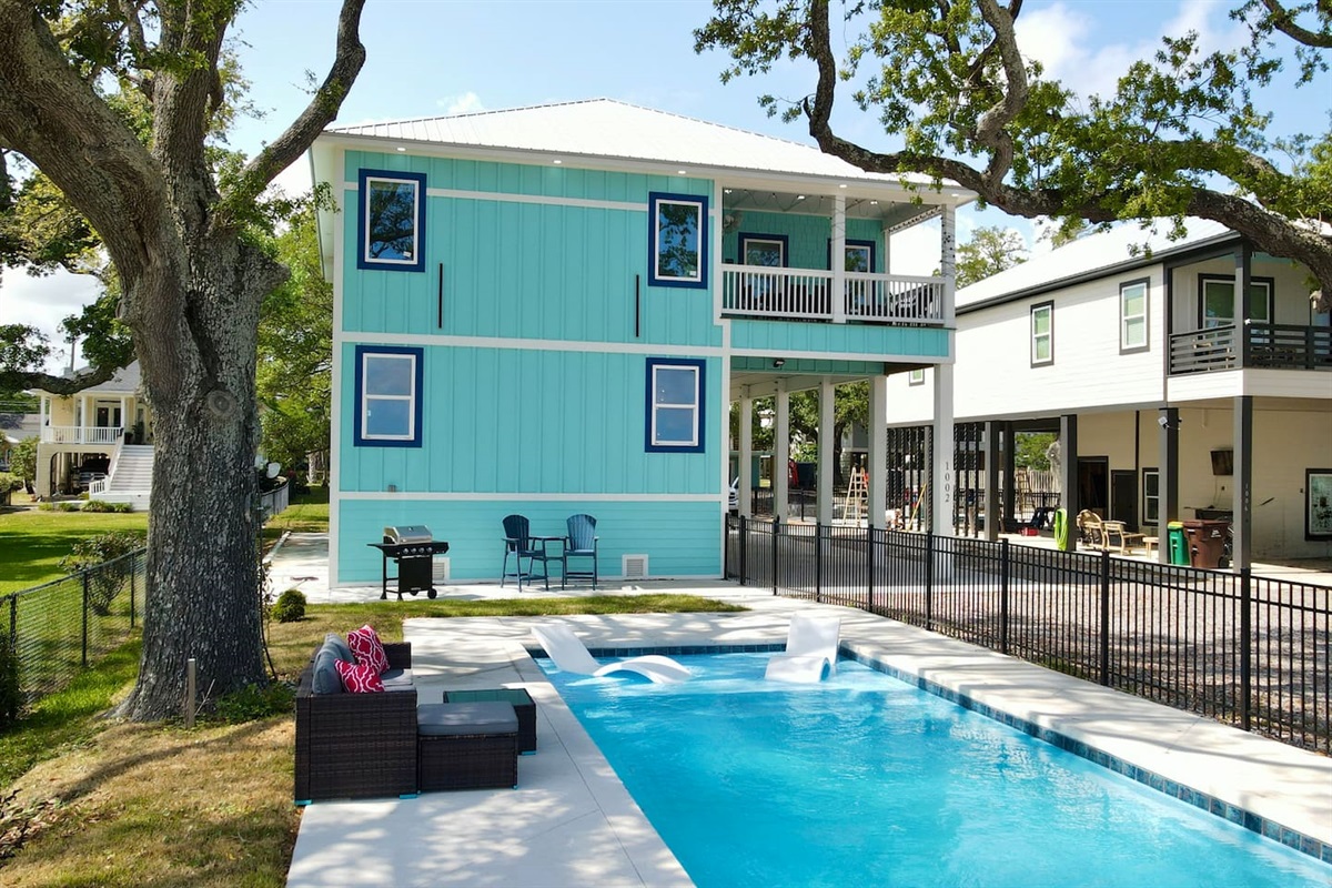 Relax poolside with ocean breezes and endless blue skies.