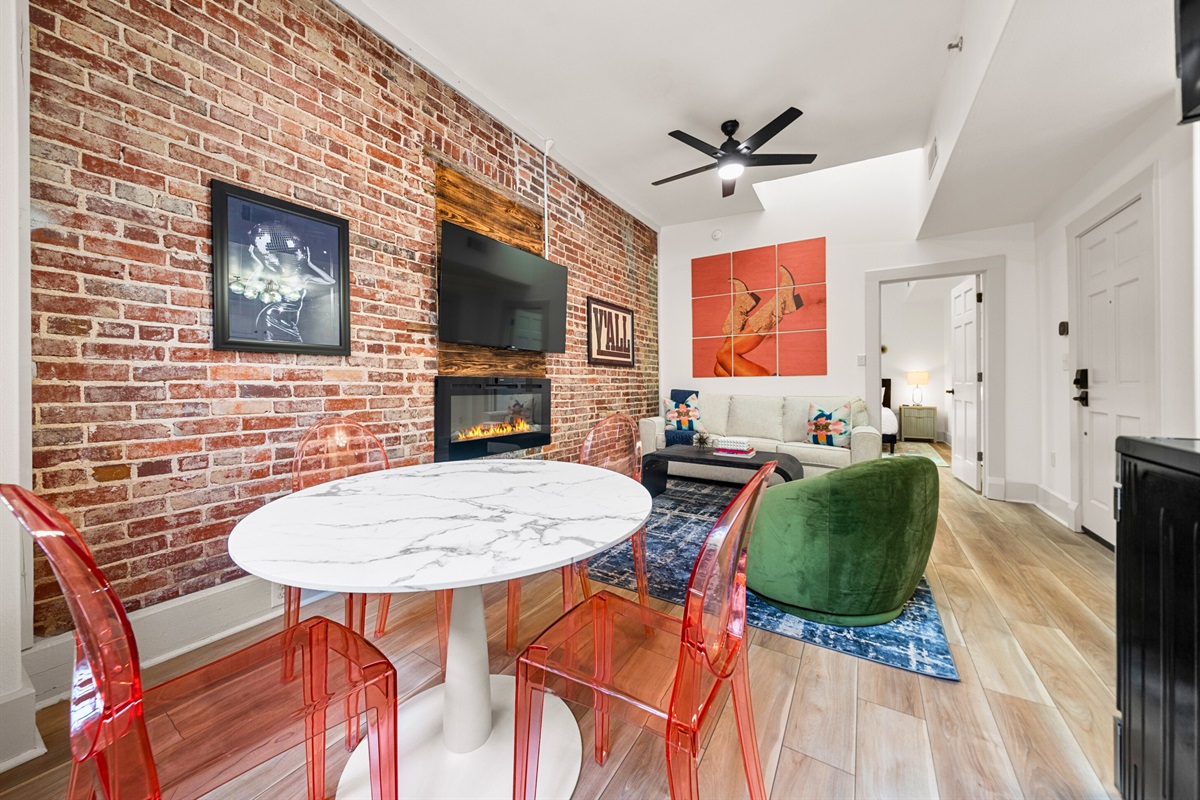 This open-plan living and dining area combines comfort and style, with plenty of space to enjoy quality time with your group.