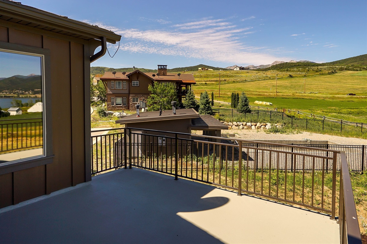Private deck with expansive views of the valley and neighborhood.