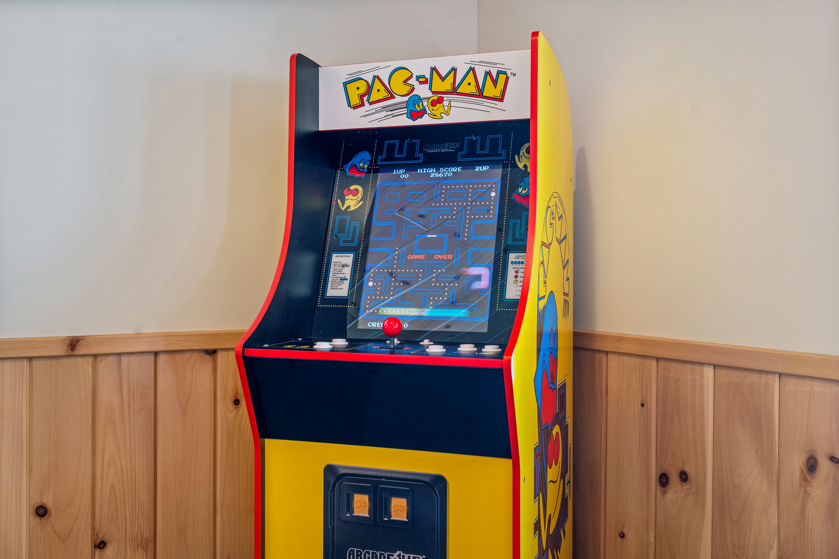 Enjoy nostalgic gaming with our Pac-Man arcade machine.