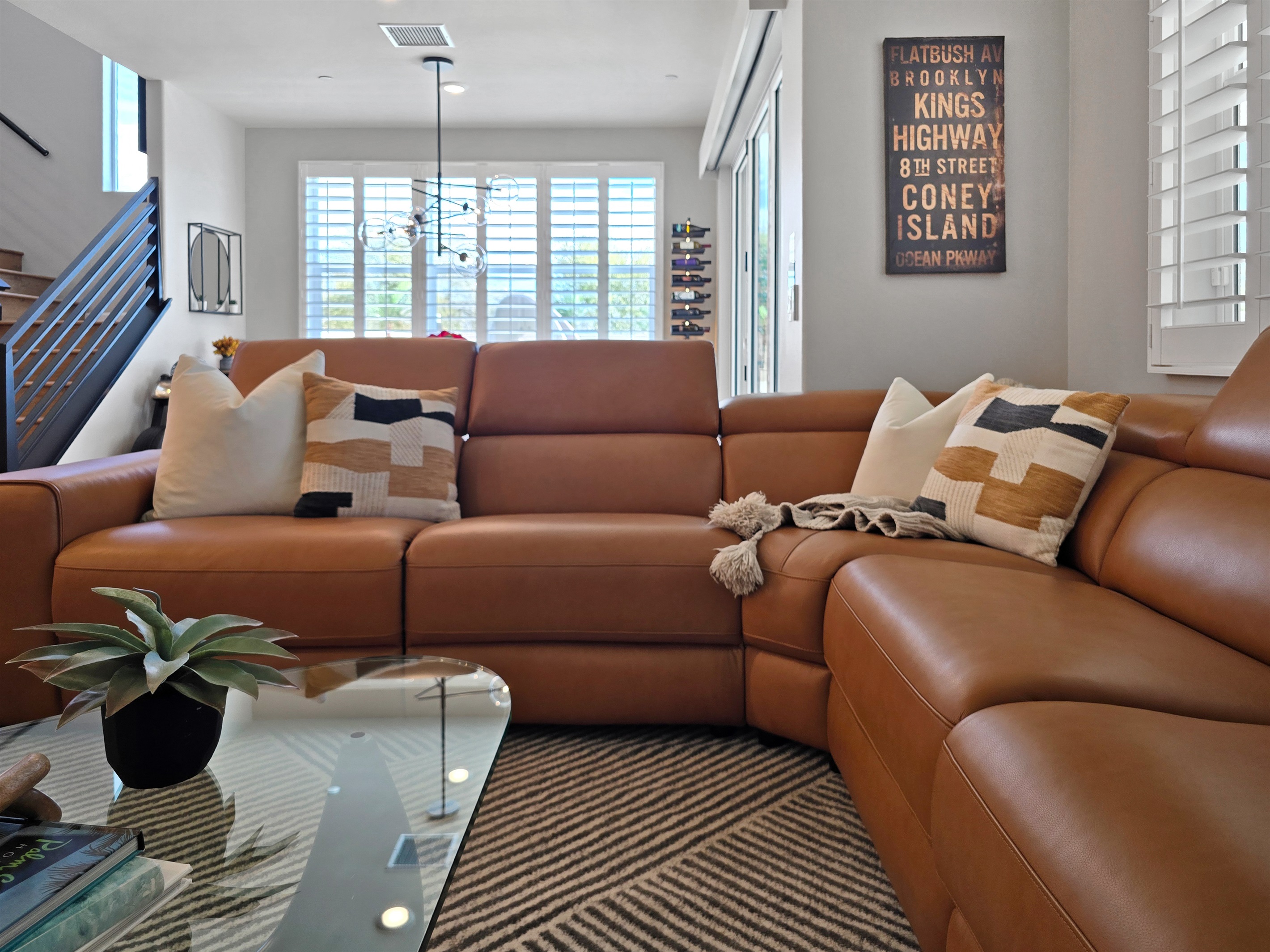 The floor plan features windows throughout for tons of natural light.