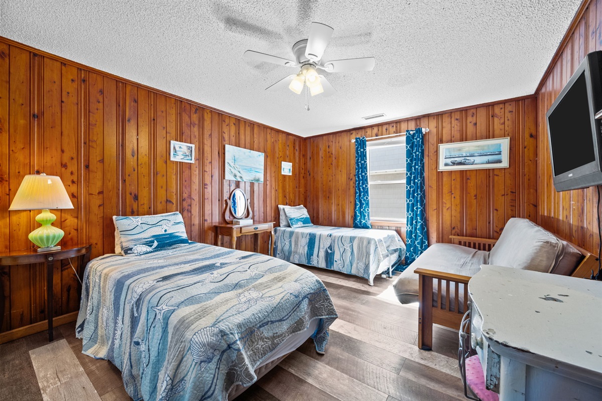  2 Twin-size beds and 1 trundle bed on 1st floor