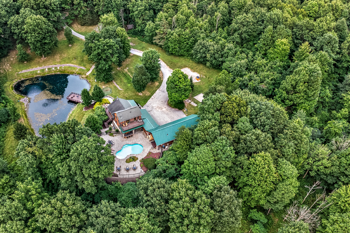 Aerial view of the wooded property