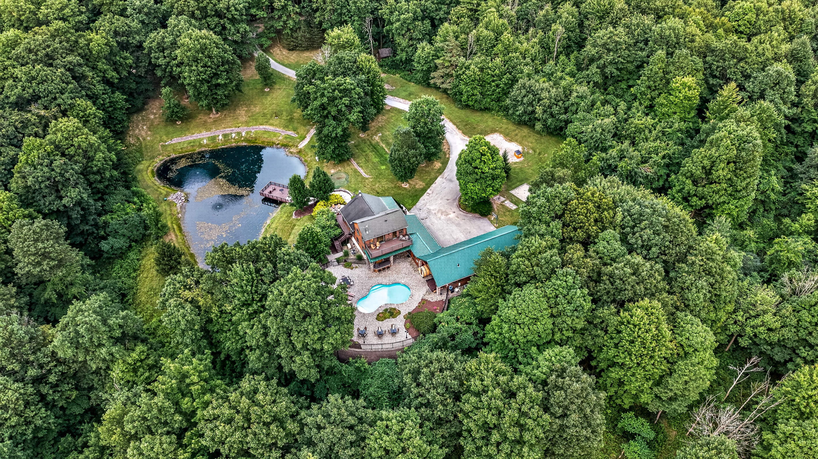 Aerial view of the wooded property