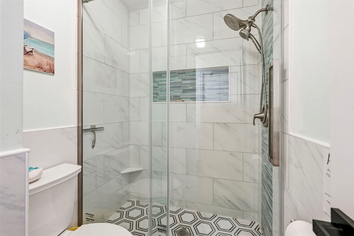 Walk in shower in ensuite bathroom