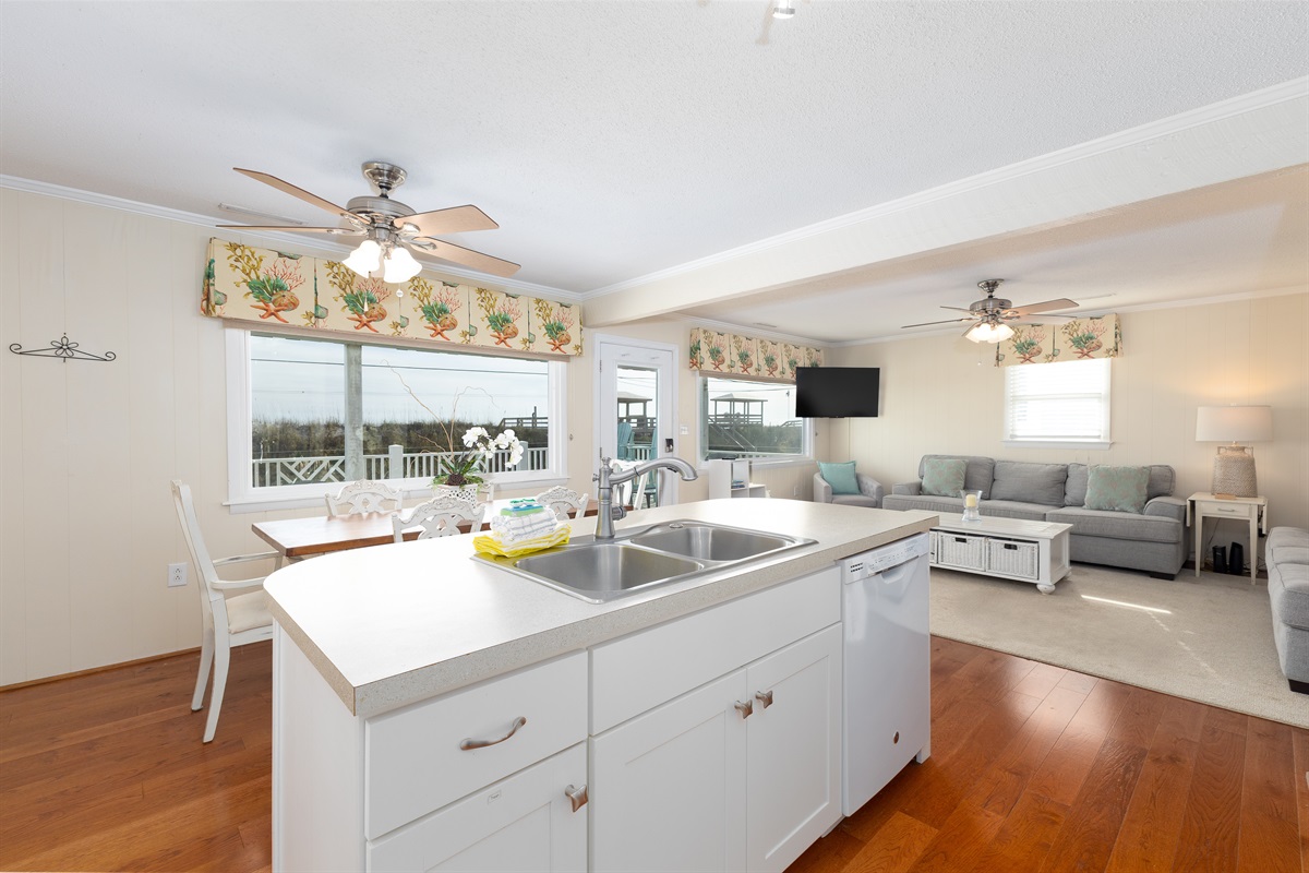 Fully equipped kitchen and spacious dining area with natural light