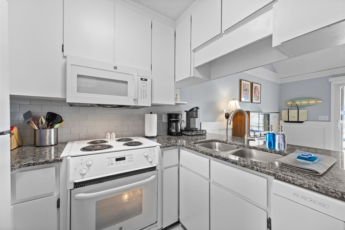 Bright, fully equipped kitchen with plenty of counter space and everything you need to cook at home