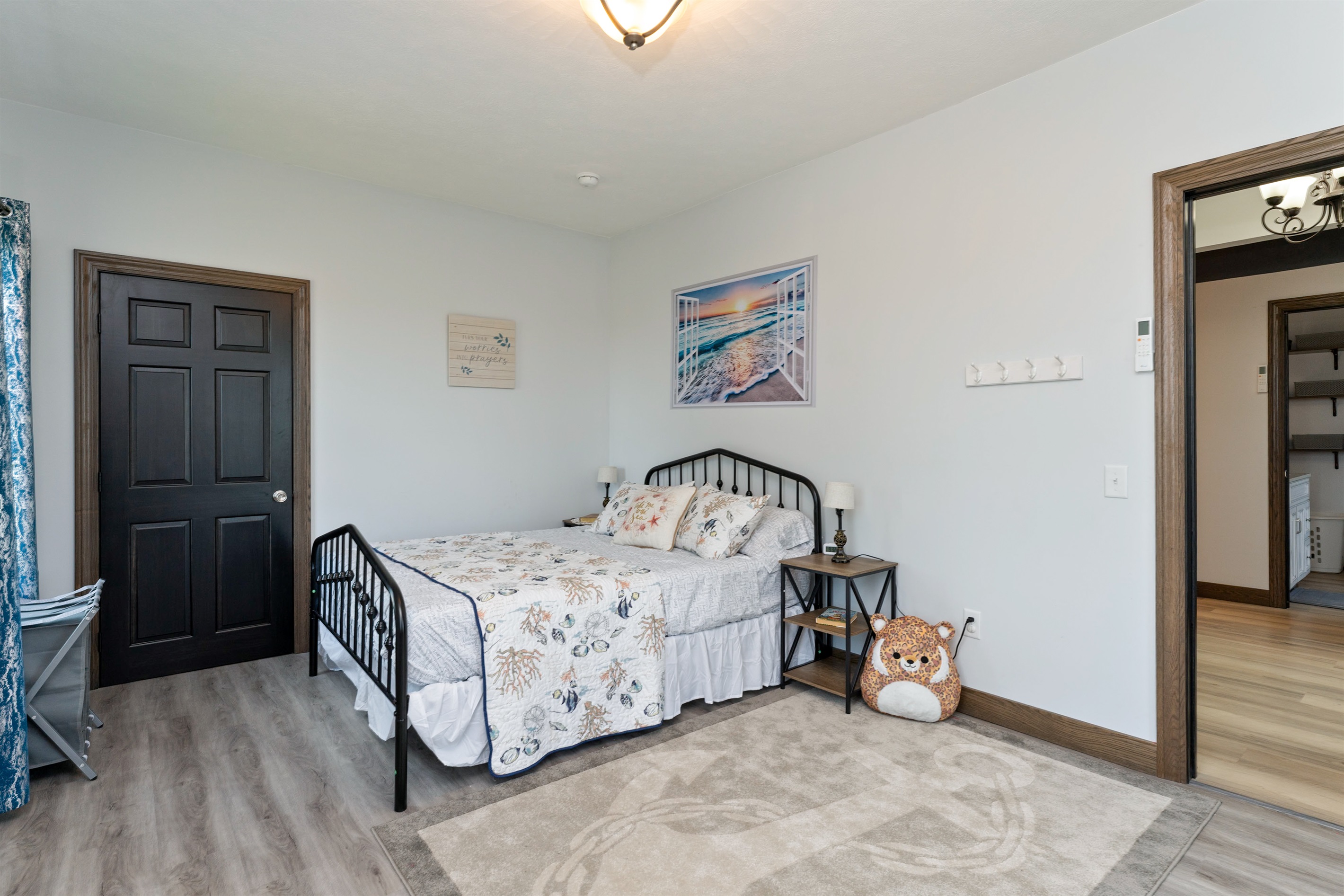 Spacious Queen bedroom with large windows, elegant décor, and peaceful country views. Bedroom #3