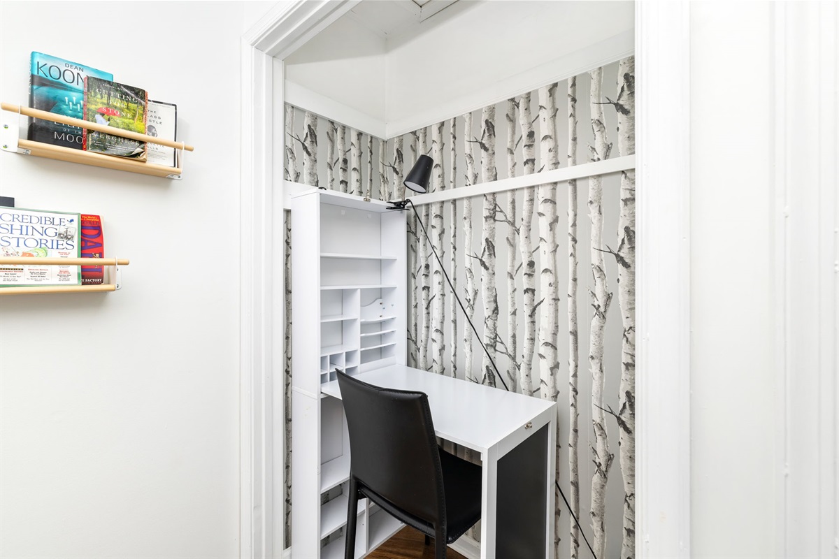 Workspace Oasis: Stylish desk nook with birch tree wallpaper—perfect for productivity!
