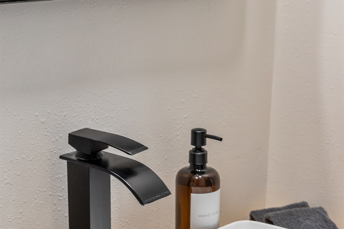 A clean, inviting bathroom with thoughtful touches for a comfortable stay.