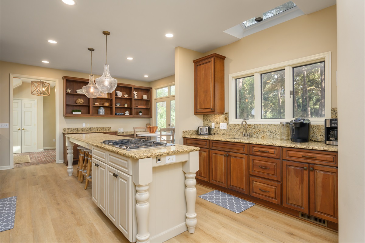 Well appointed kitchen features stainless steel appliances