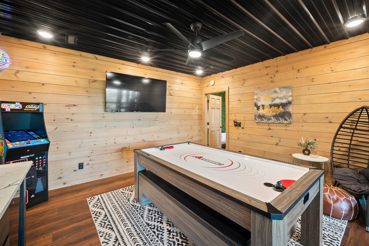 The game room features a ping pong/air hockey combo for endless entertainment.