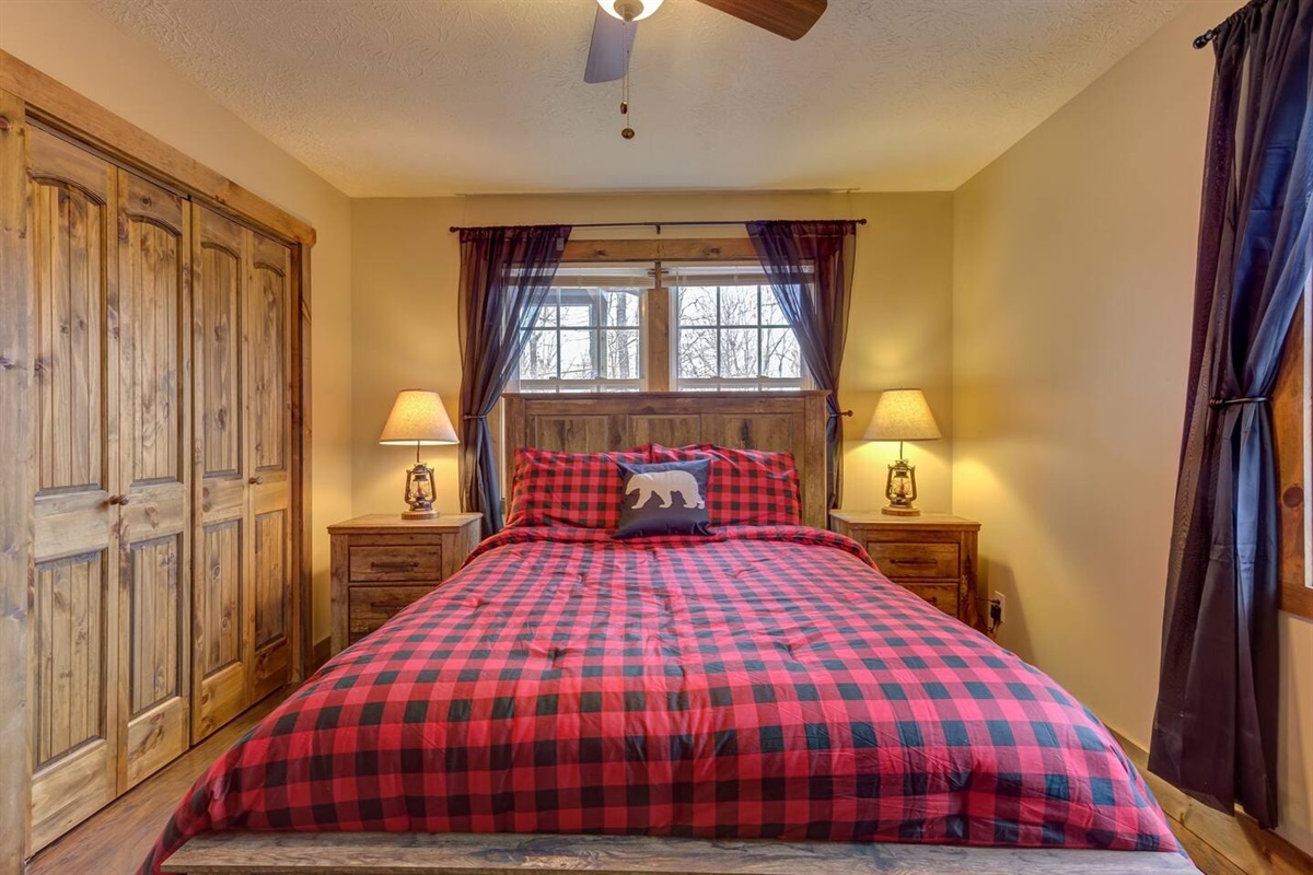 Queen bed in guest bedroom