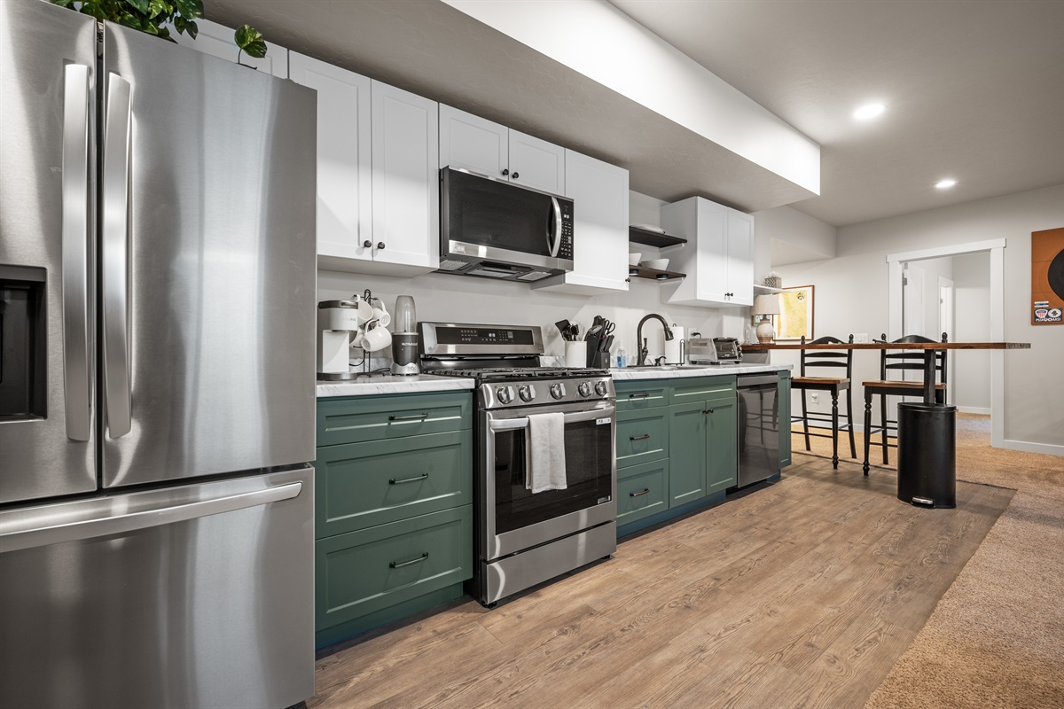 This cozy kitchen bar offers additional seating for two, making it a great spot for snacks, drinks, or conversation.