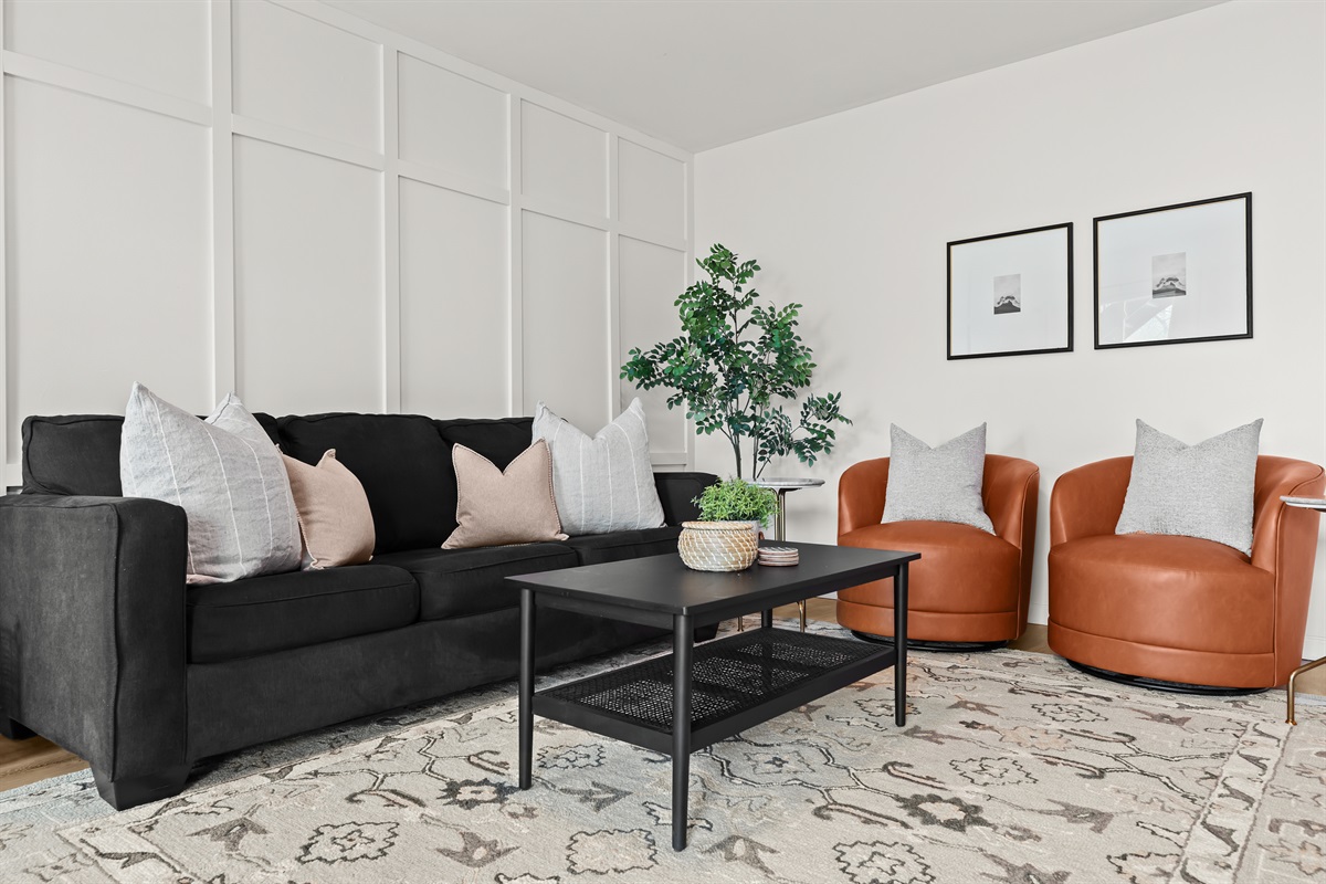 Relax in style with plush seating and cozy modern touches—perfect for movie nights or morning coffee.
