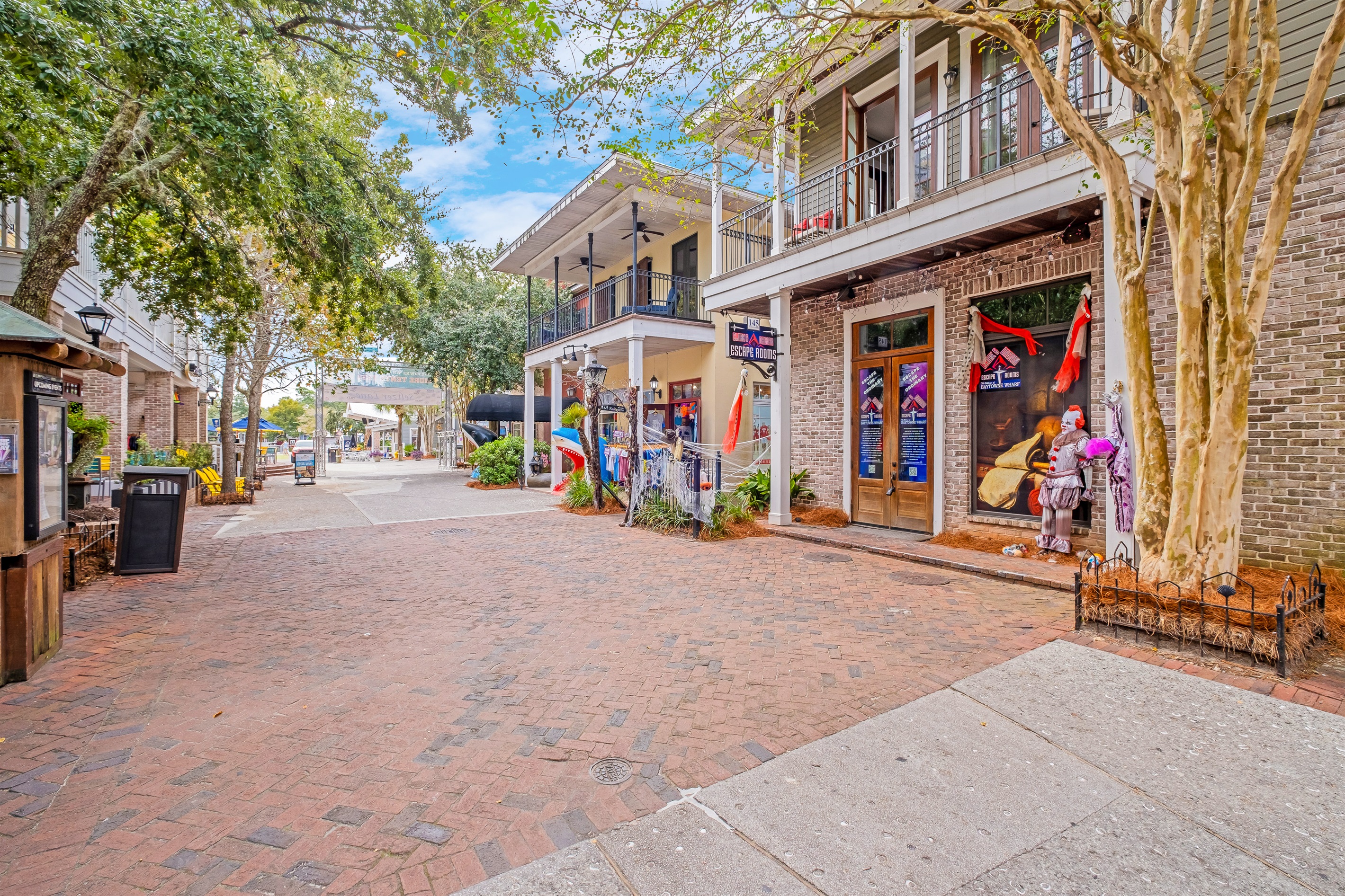 Explore the quaint shopping street lined with boutiques and shops. Brick pathways and lush greenery make for a cozy stroll.