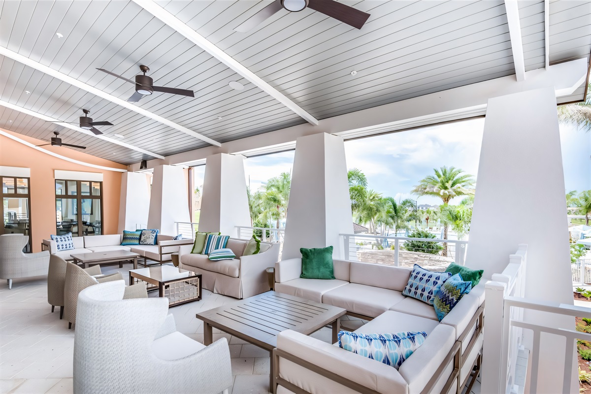Outdoor Lounge: Relax in style with plush seating and a tropical view all around!