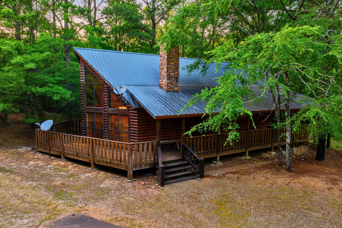 Exterior view of your woodland cabin escape.
