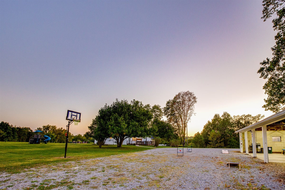 Newly added: Basketball goal by the game barn!