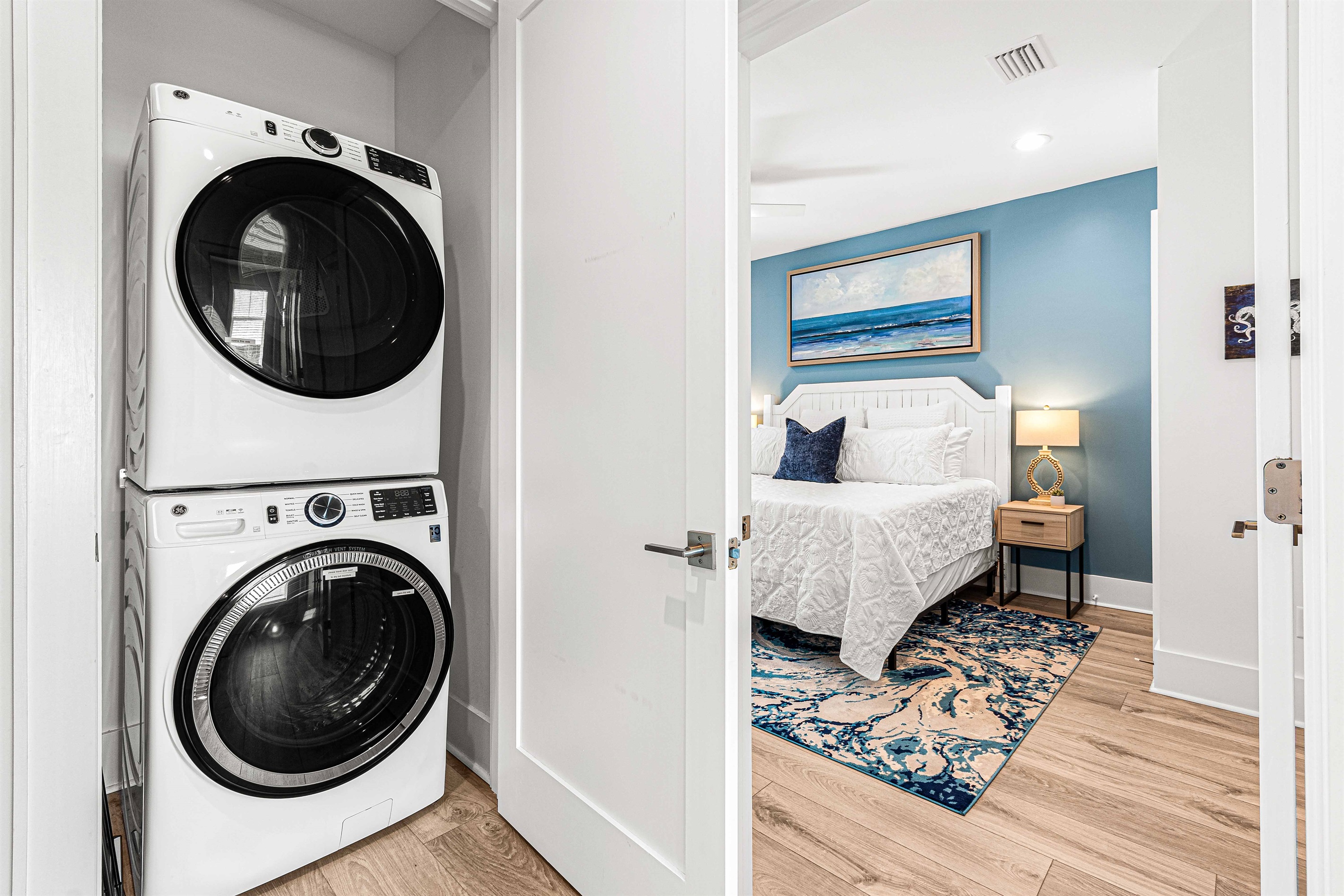 Full sized washer and dryer are located upstairs on the landing.