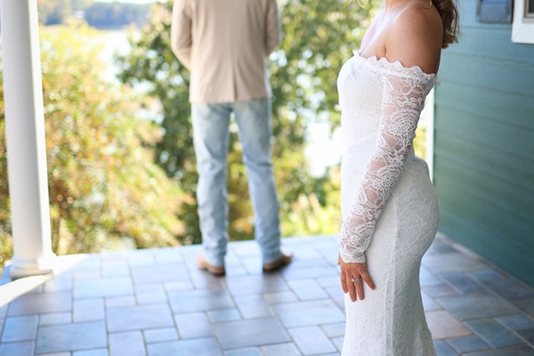 Bride and Groom on front porch
